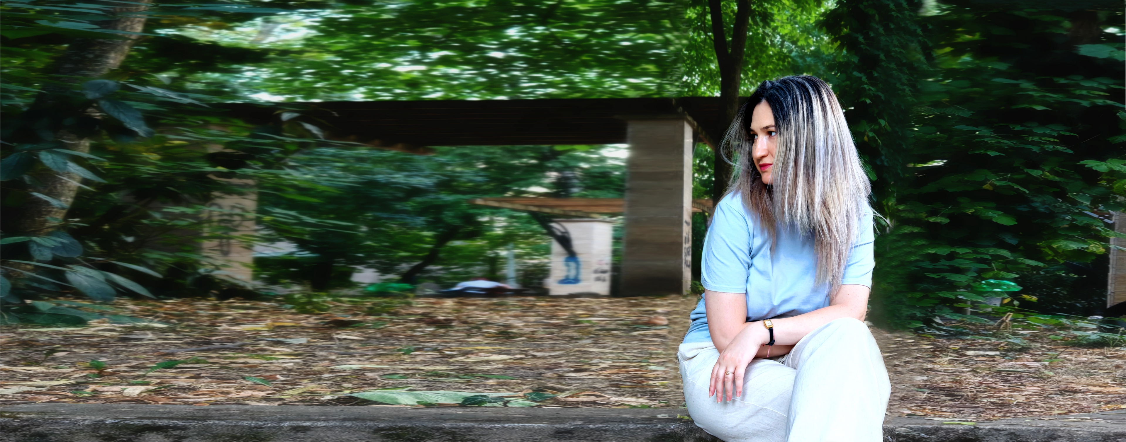 Home banner showing a female model wearing a natural indigo dyed organic cotton T-shirt.